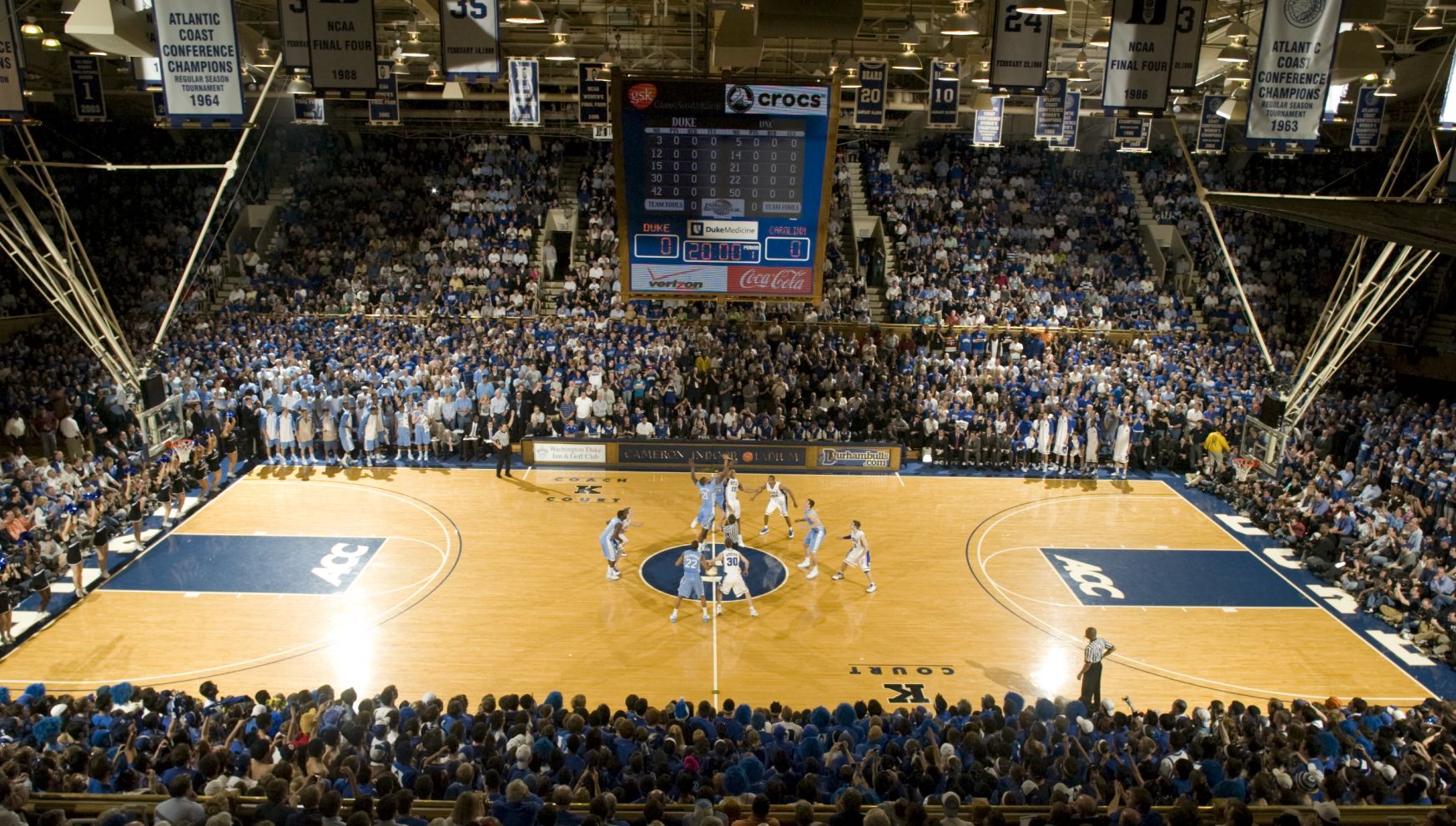 A Basketball Game In A Stadium