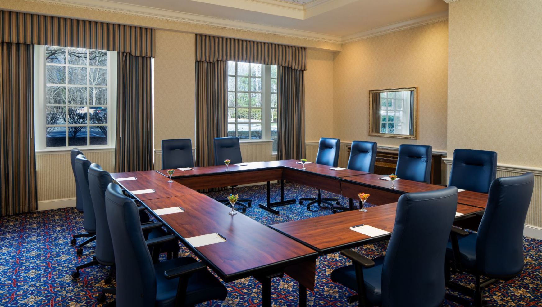 A Conference Room With A Large Table